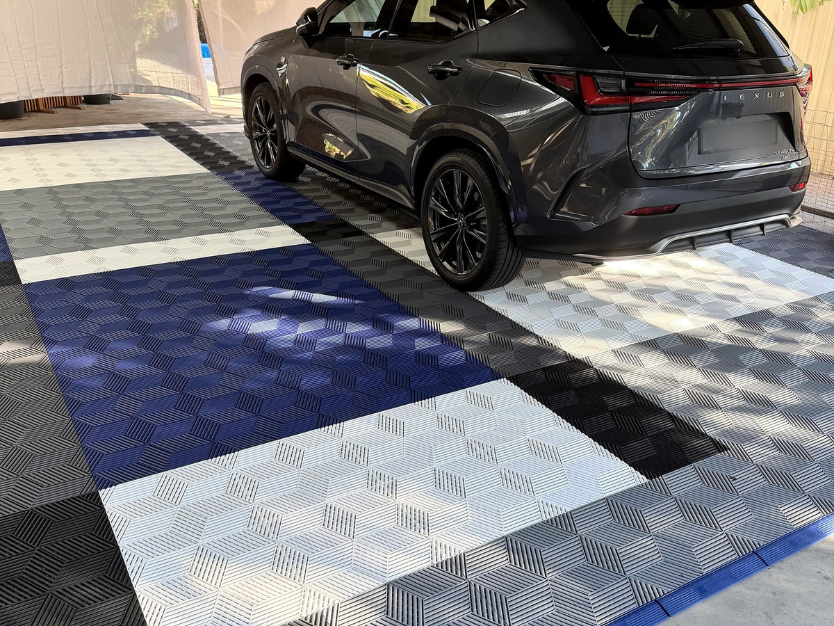 A customer's garage floor in ULTRACUBE Space Grey, Silver Grey, Alpine White, Jet Black and Night Blue