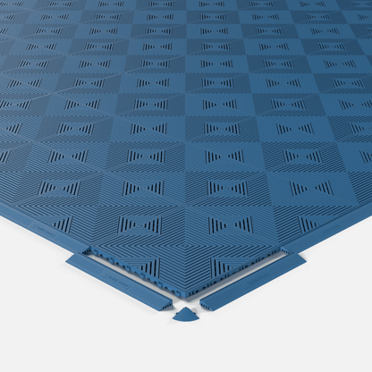 ULTRACORE garage floor tile in Aero Blue, shown with an edge ramp