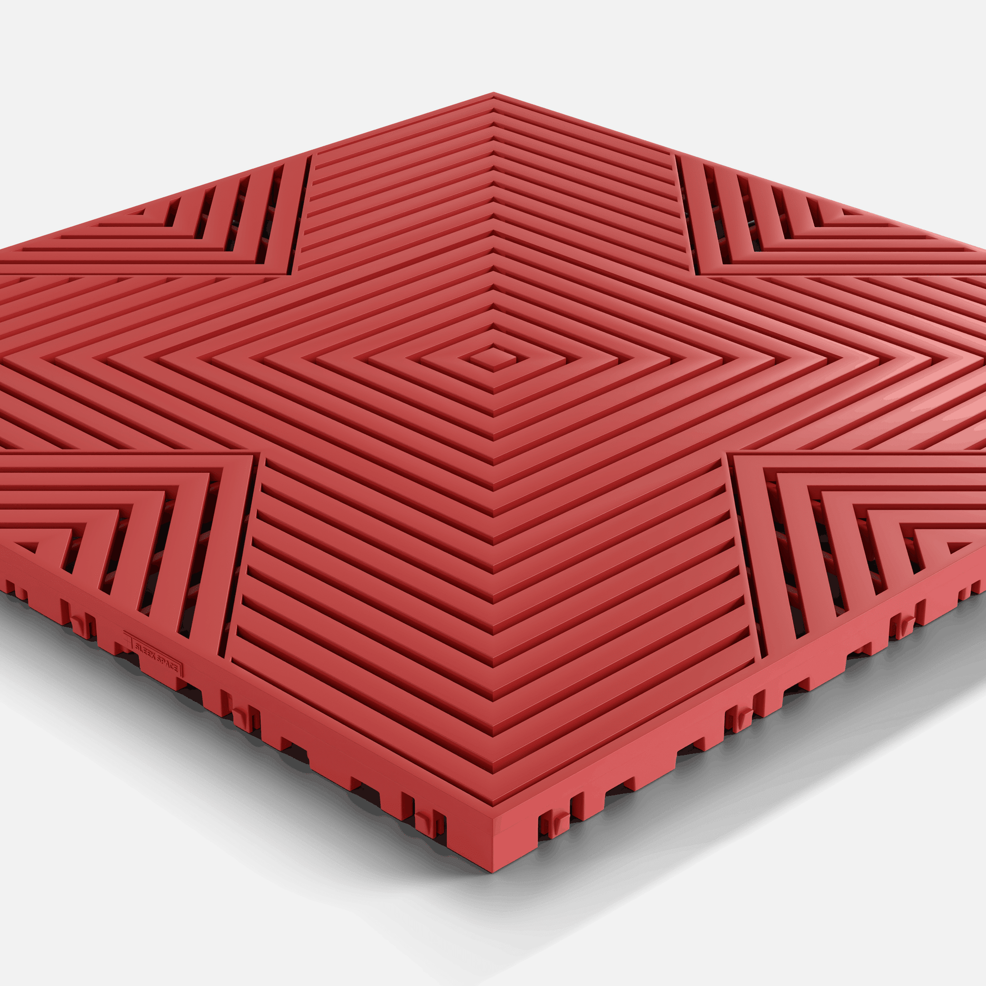 ULTRACORE garage floor tile in Crimson Red, single tile seen from a low angle