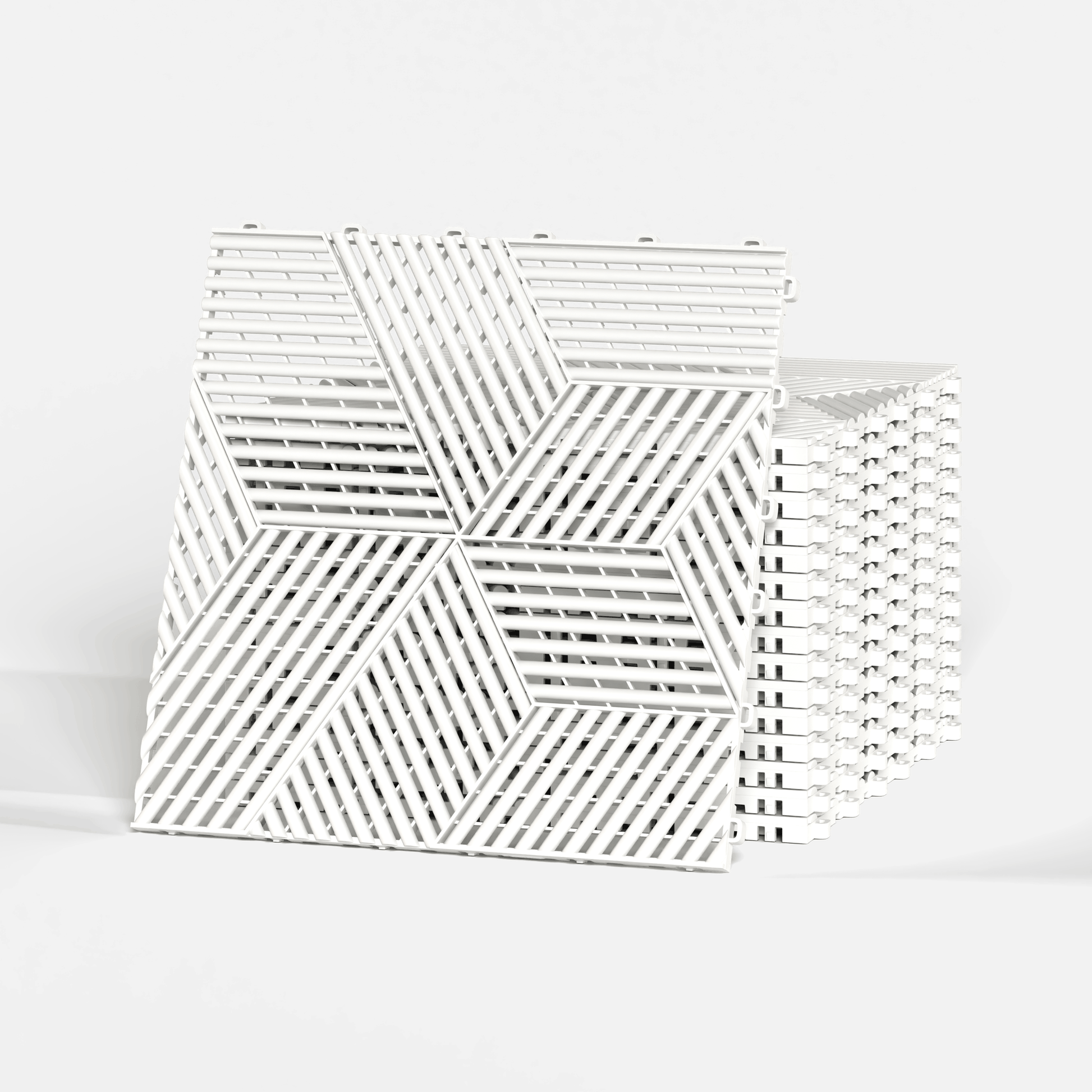 ULTRACUBE garage floor tile in Alpine White, a stack of tiles