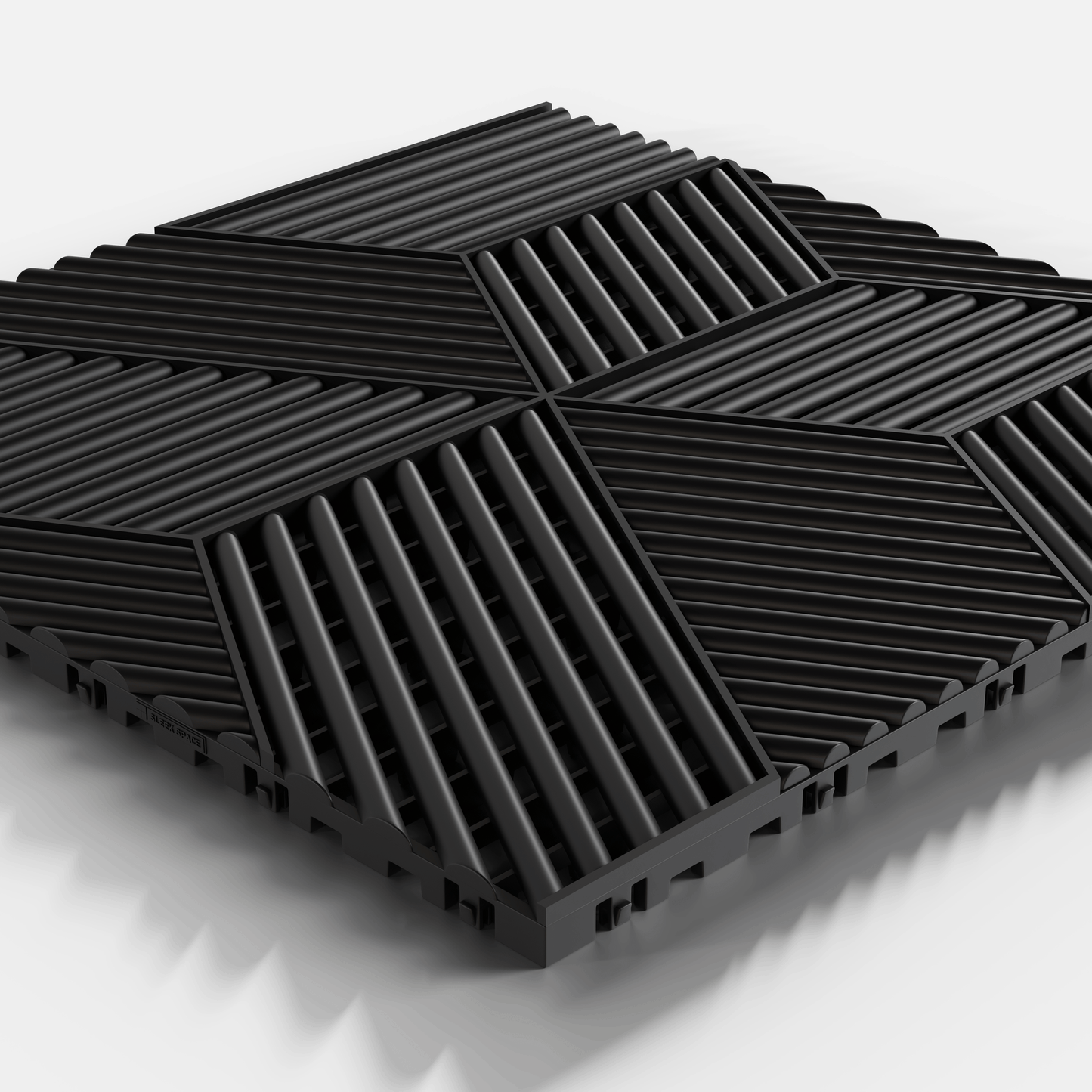 ULTRACUBE garage floor tile in Jet Black, single tile seen from a low angle