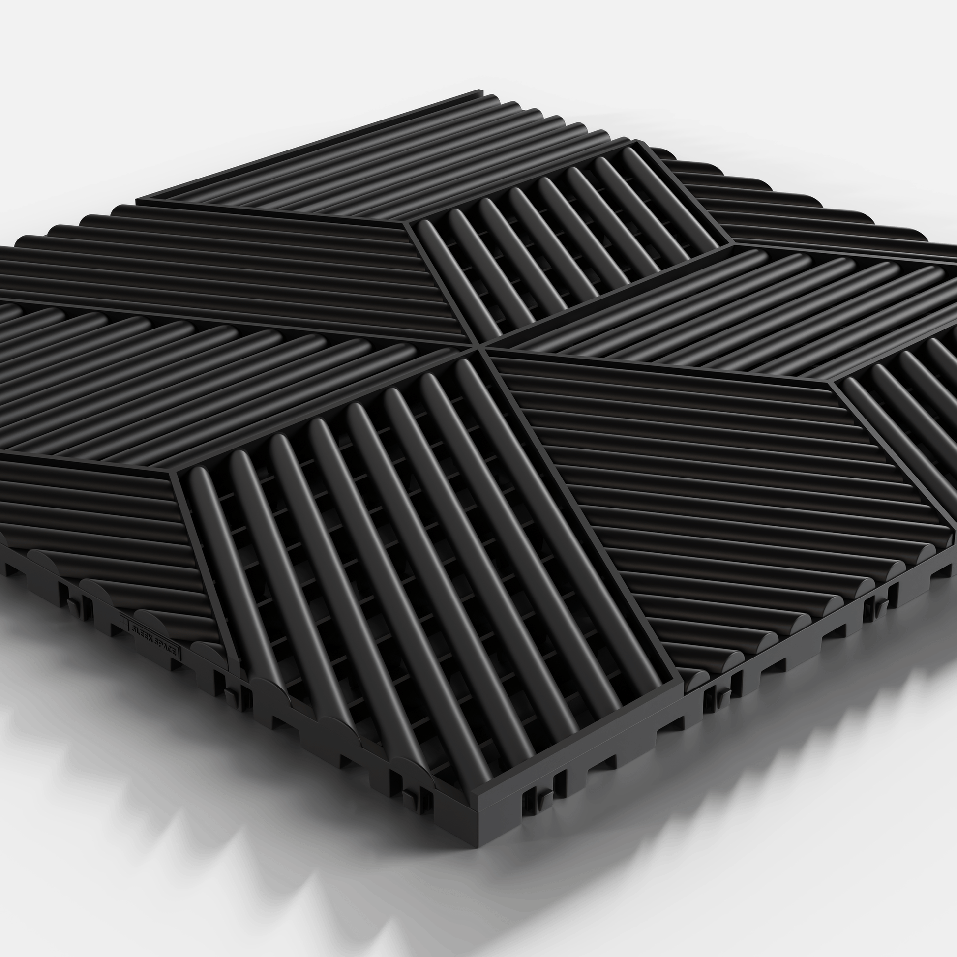 ULTRACUBE garage floor tile in Jet Black, single tile seen from a low angle