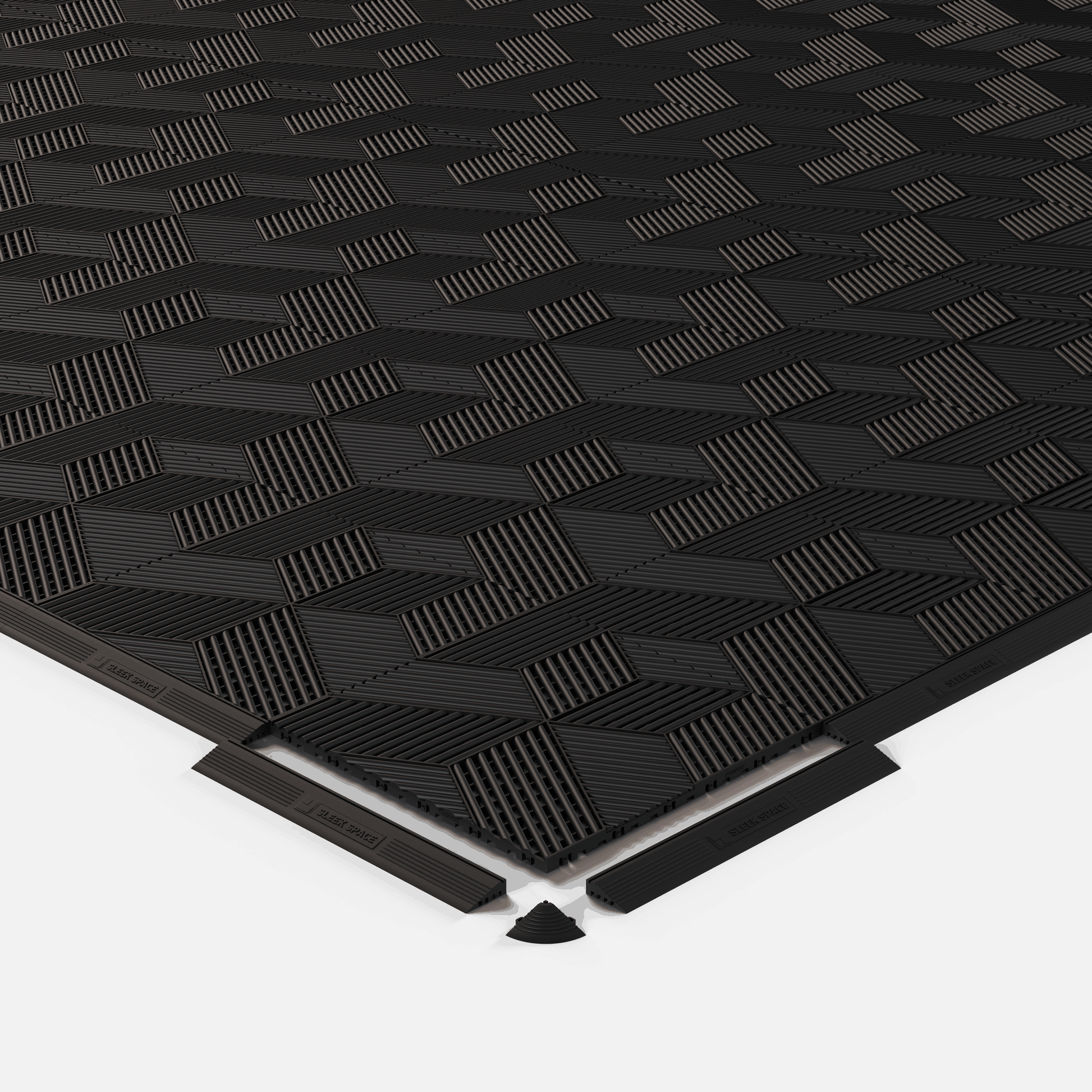 ULTRACUBE garage floor tile in Jet Black, shown with an edge ramp