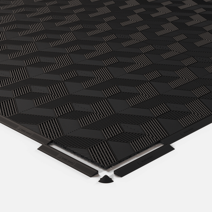ULTRACUBE garage floor tile in Jet Black, shown with an edge ramp