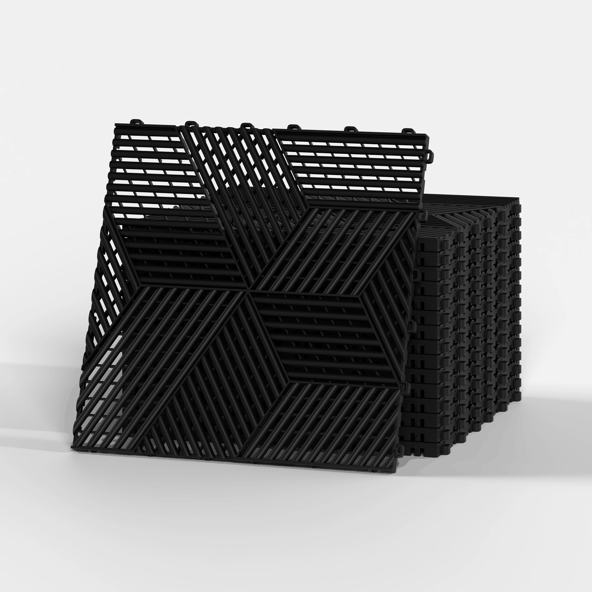 ULTRACUBE garage floor tile in Jet Black, a stack of tiles