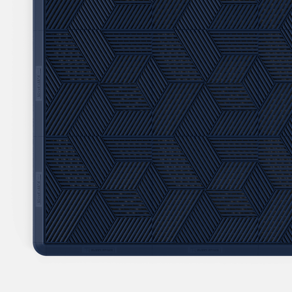 ULTRACUBE garage floor tile in Night Blue, with an edge ramp fitted