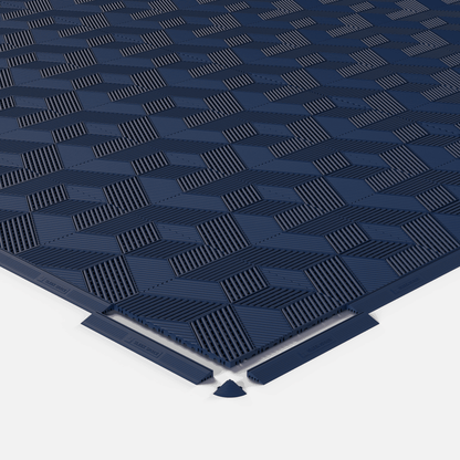 ULTRACUBE garage floor tile in Night Blue, shown with an edge ramp