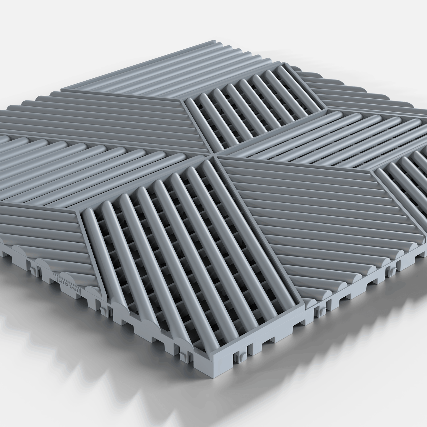ULTRACUBE garage floor tile in Silver Grey, single tile seen from a low angle
