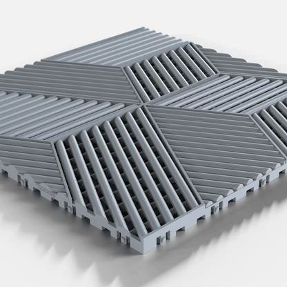 ULTRACUBE garage floor tile in Silver Grey, single tile seen from a low angle