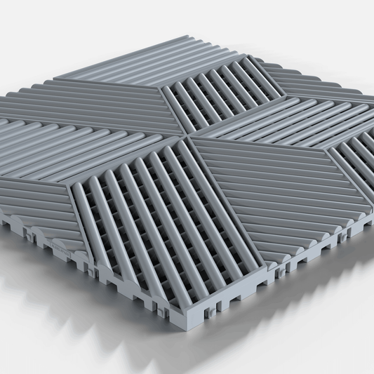 ULTRACUBE garage floor tile in Silver Grey, single tile seen from a low angle