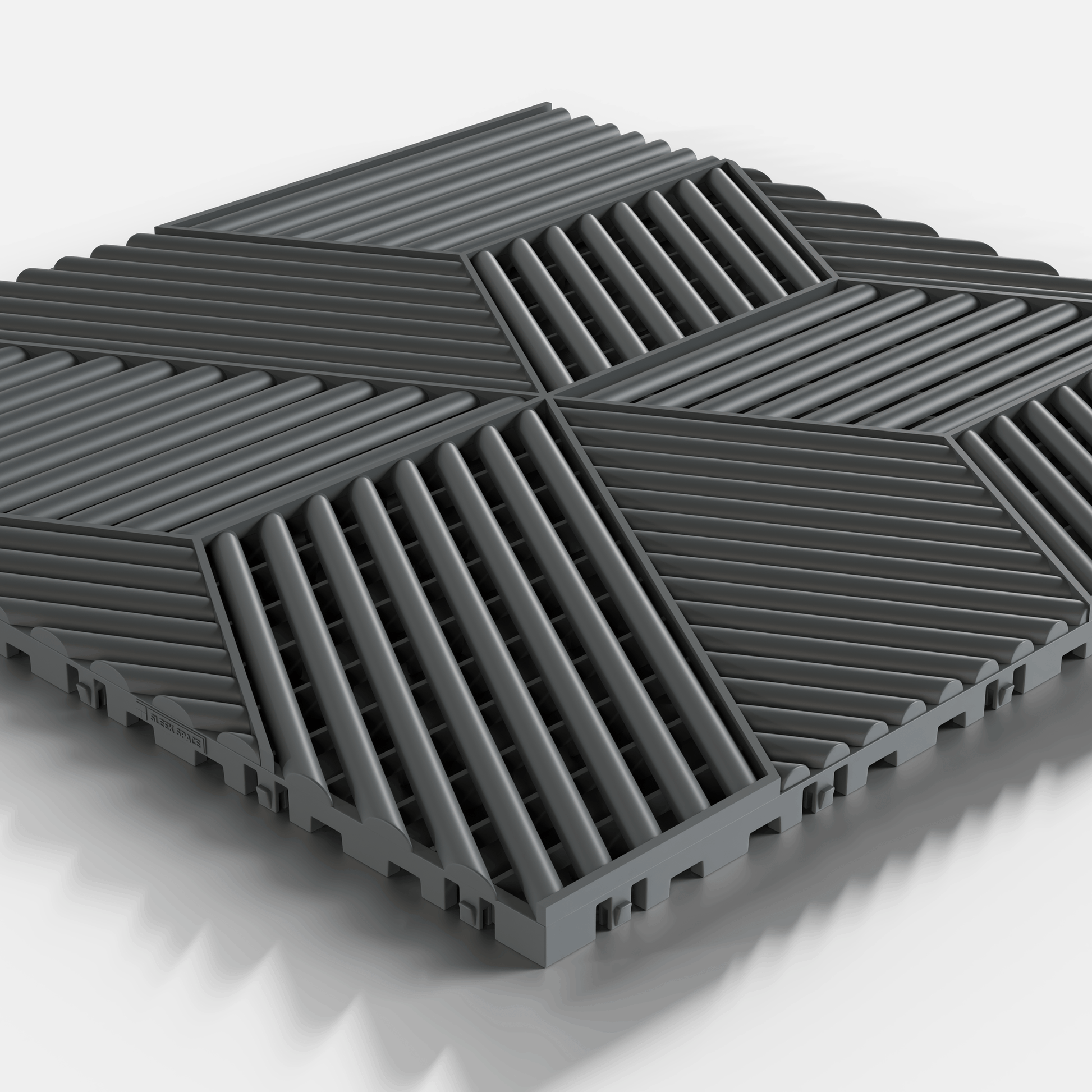 ULTRACUBE garage floor tile in Space Grey, single tile seen from a low angle
