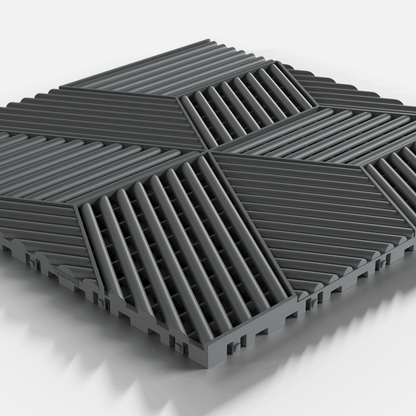 ULTRACUBE garage floor tile in Space Grey, single tile seen from a low angle