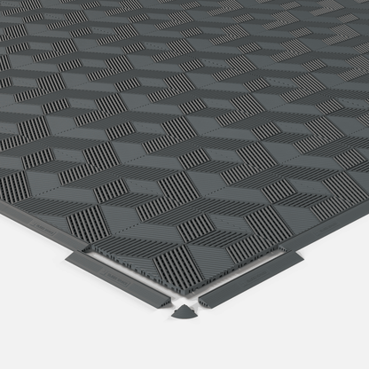 ULTRACUBE garage floor tile in Space Grey, shown with an edge ramp