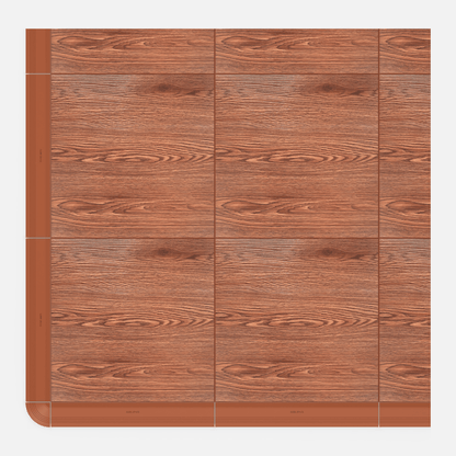 ULTRADECO modular floor tile in Copper Oak, with an edge ramp fitted