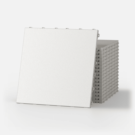ULTRADECO modular floor tile in Frost White, a stack of tiles