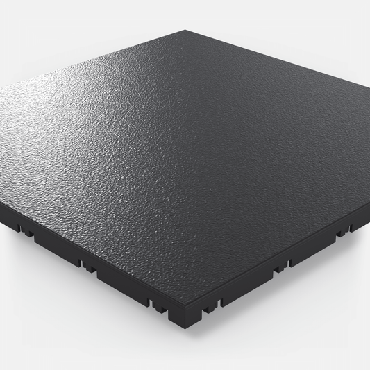ULTRADECO modular floor tile in Onyx Black, single tile seen from a low angle