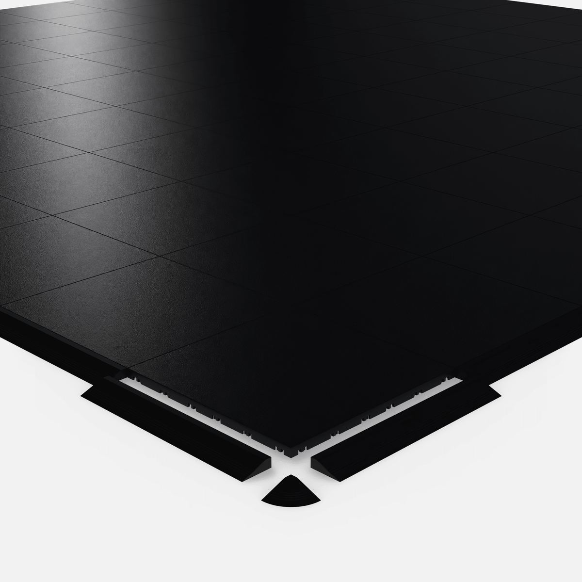 ULTRADECO modular floor tile in Onyx Black, shown with an edge ramp