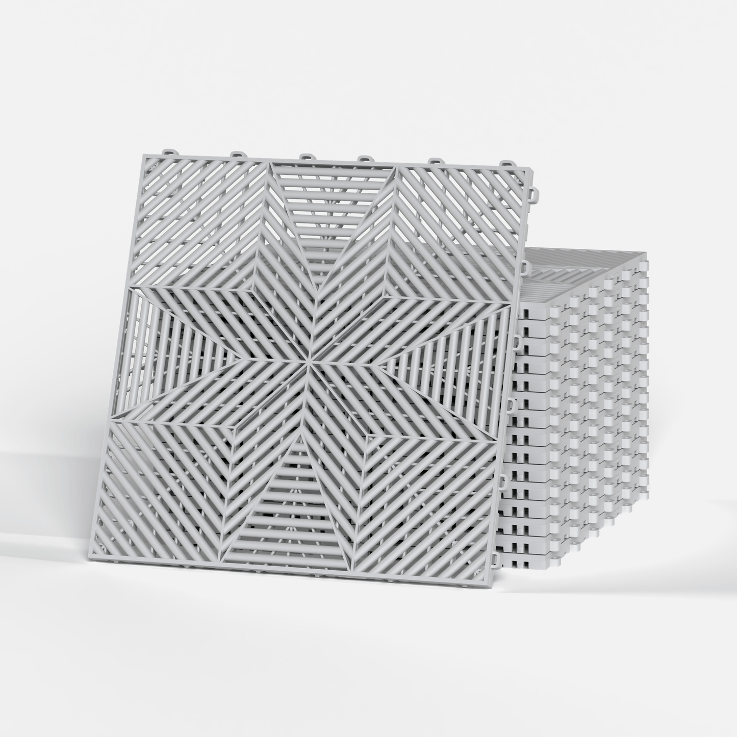 ULTRAFLUX garage floor tile in Glacier Grey, a stack of tiles