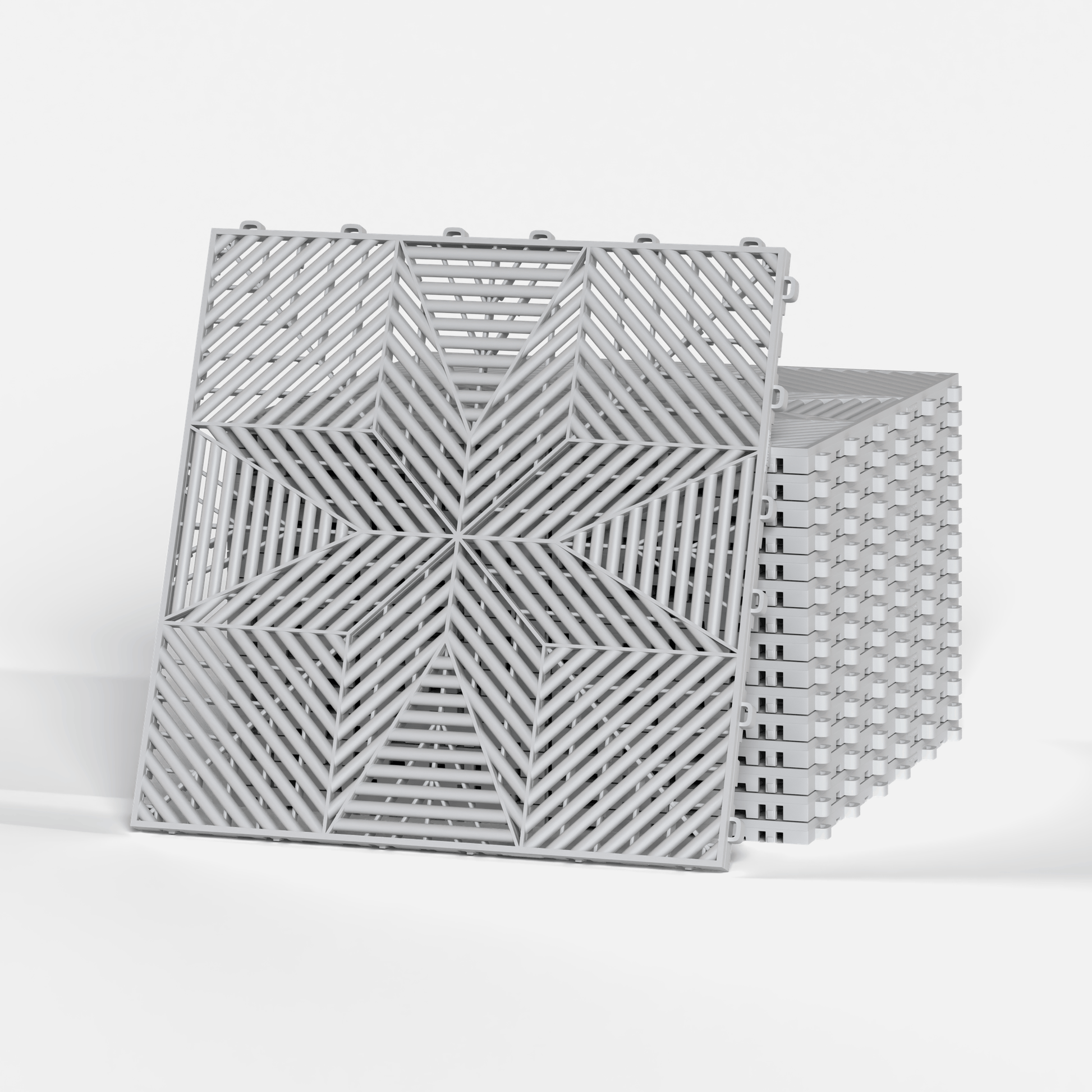 ULTRAFLUX garage floor tile in Glacier Grey, a stack of tiles
