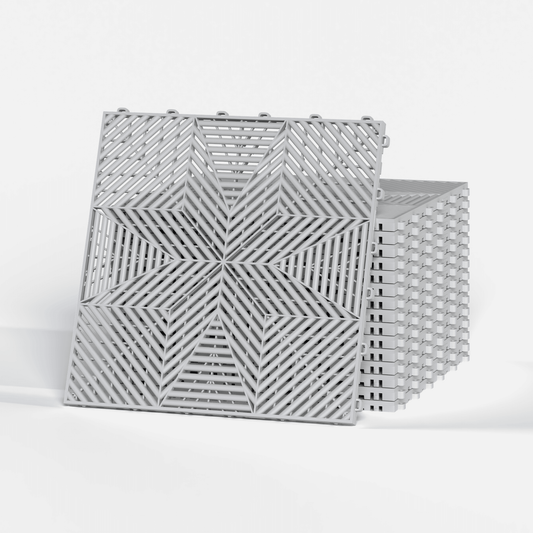 ULTRAFLUX garage floor tile in Glacier Grey, a stack of tiles