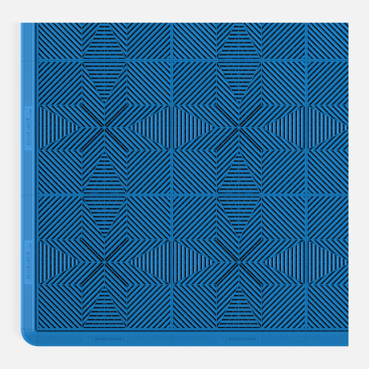 ULTRAFLUX garage floor tile in Riviera Blue, with an edge ramp fitted