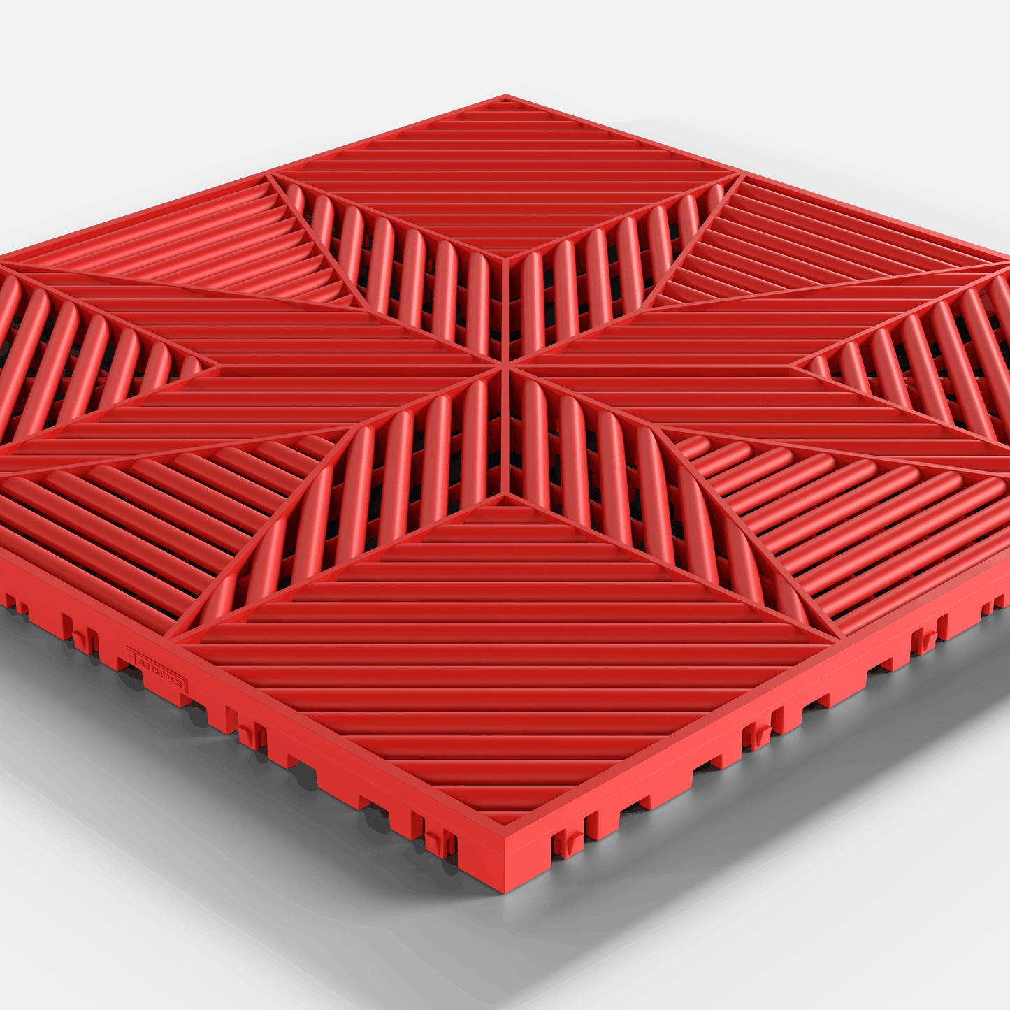 ULTRAFLUX garage floor tile in Rosso Red, single tile seen from a low angle
