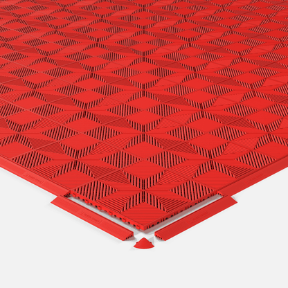 ULTRAFLUX garage floor tile in Rosso Red, shown with an edge ramp