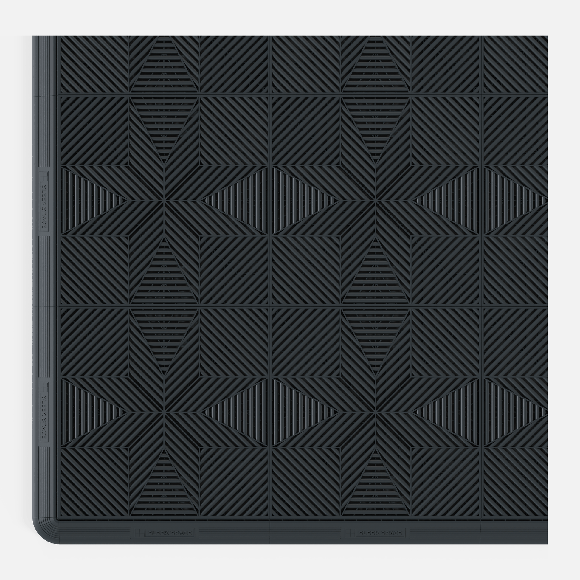 ULTRAFLUX garage floor tile in Stealth Grey, with an edge ramp fitted