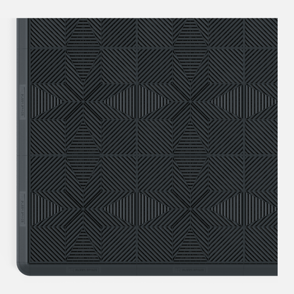 ULTRAFLUX garage floor tile in Stealth Grey, with an edge ramp fitted