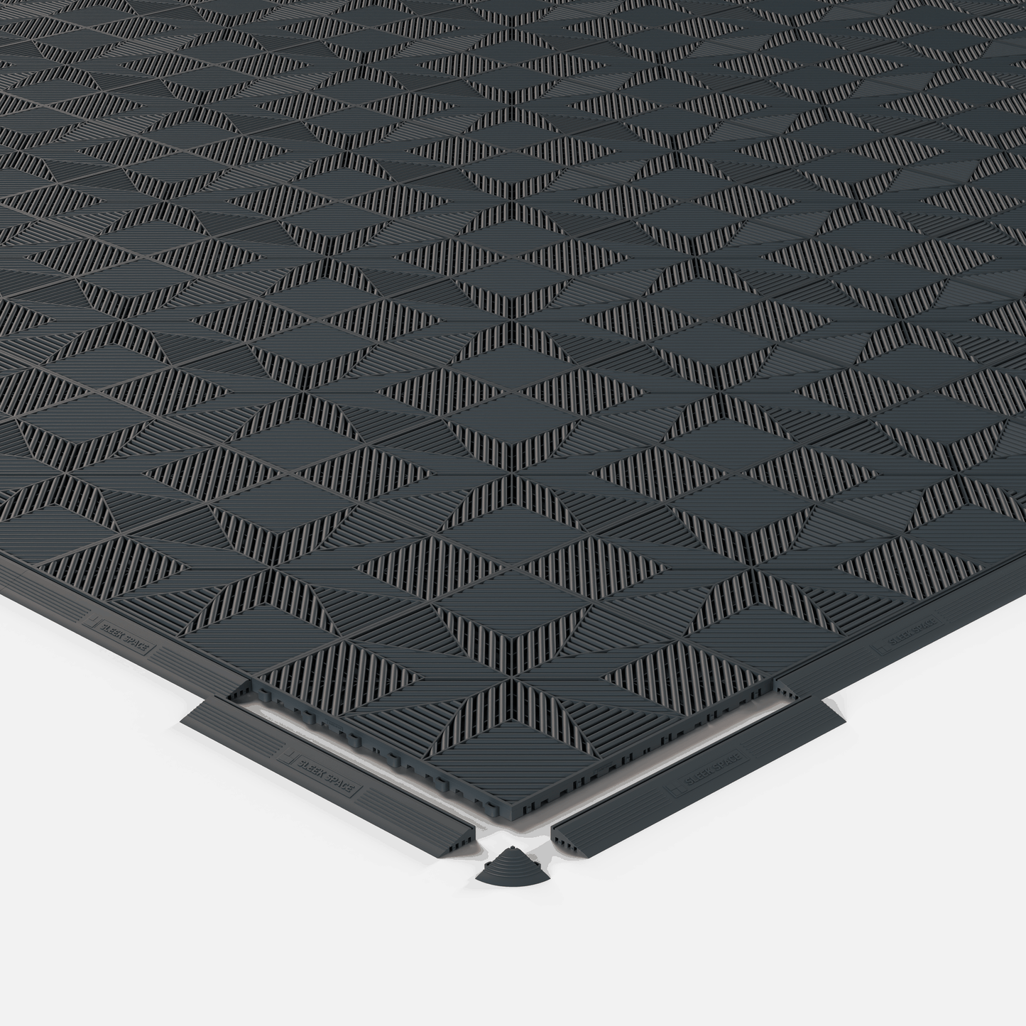 ULTRAFLUX garage floor tile in Stealth Grey, shown with an edge ramp