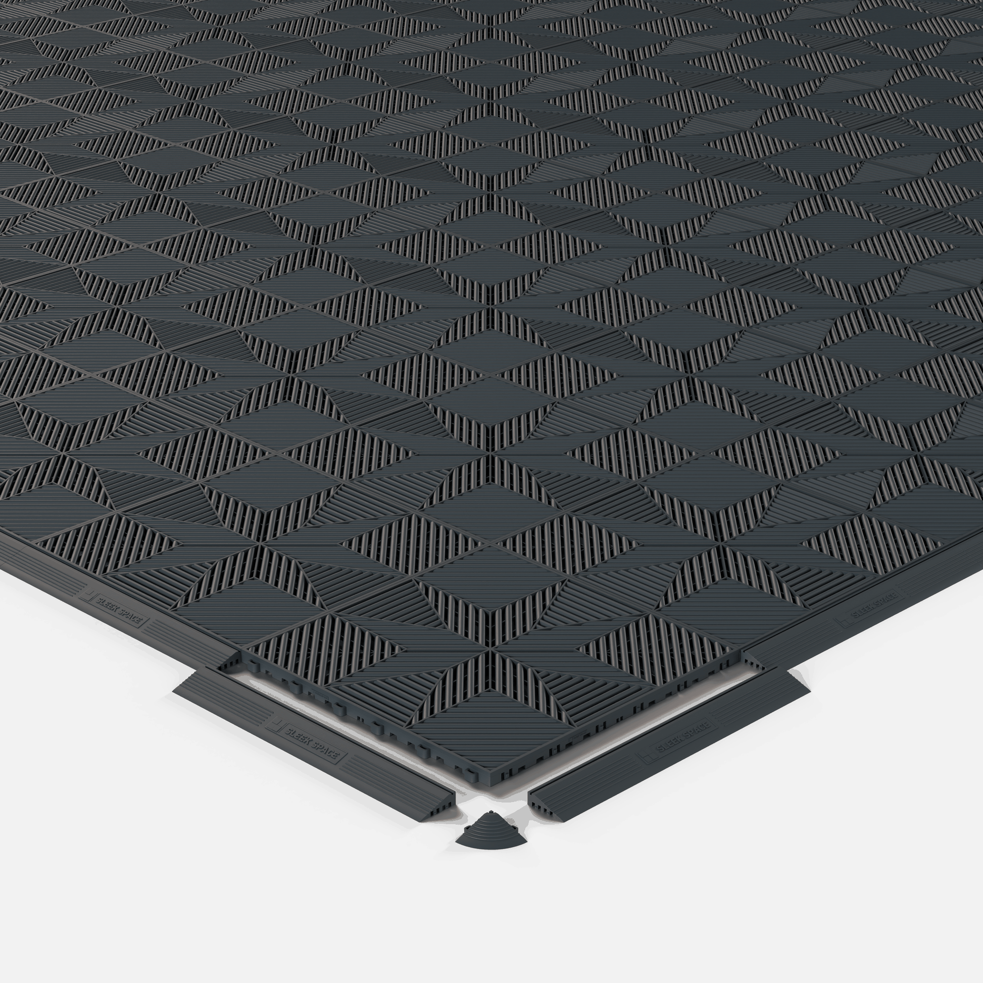ULTRAFLUX garage floor tile in Stealth Grey, shown with an edge ramp