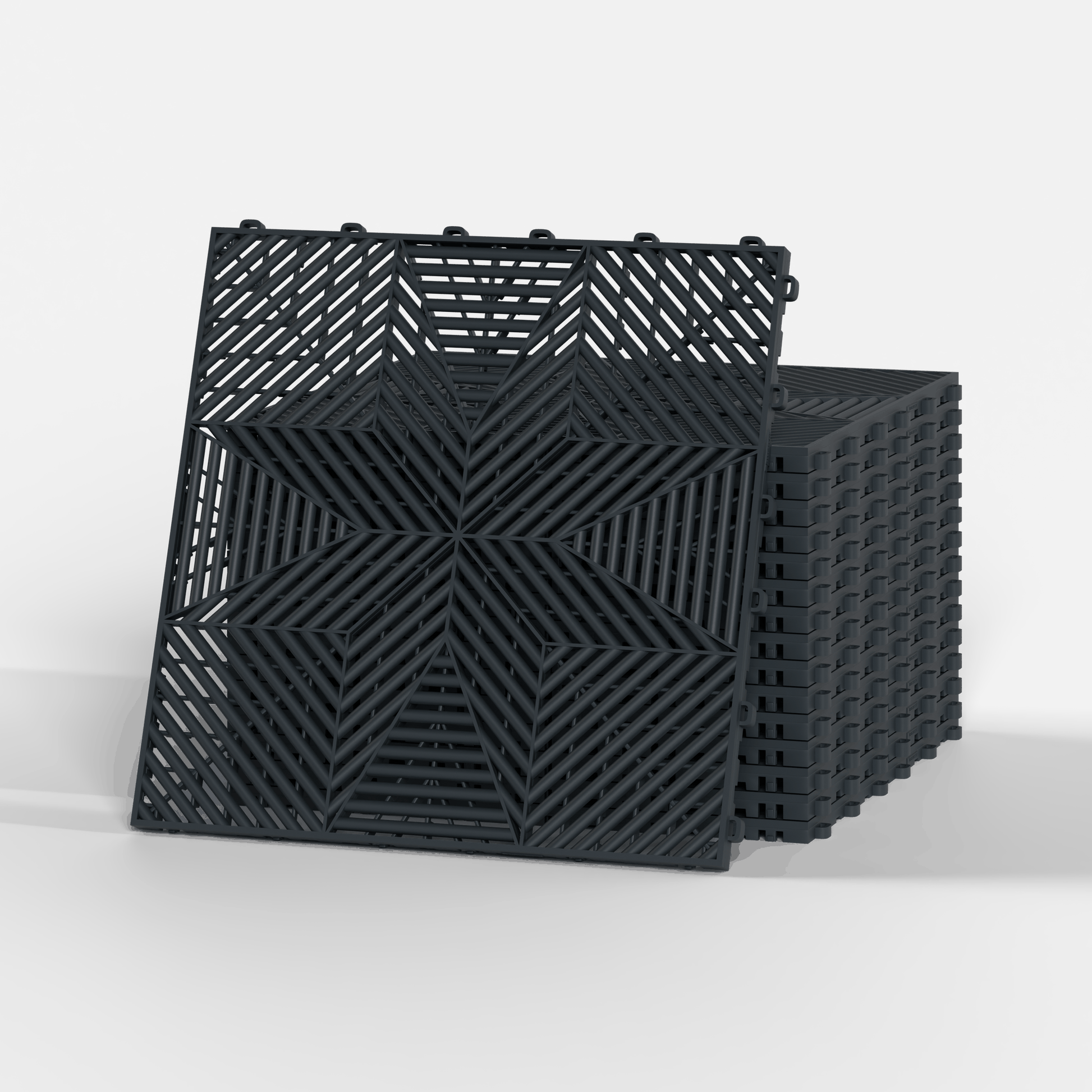 ULTRAFLUX garage floor tile in Stealth Grey, a stack of tiles