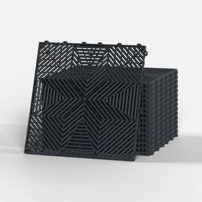 ULTRAFLUX garage floor tile in Stealth Grey, a stack of tiles