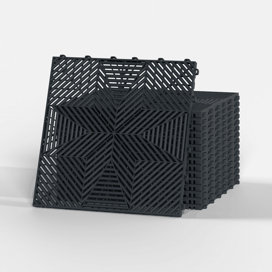 ULTRAFLUX garage floor tile in Stealth Grey, a stack of tiles