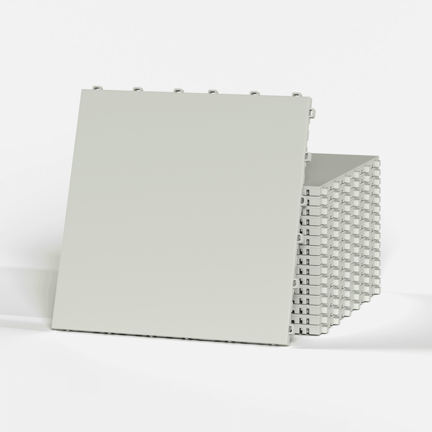 ULTRATONE modular floor tile in Coastal Grey, a stack of tiles