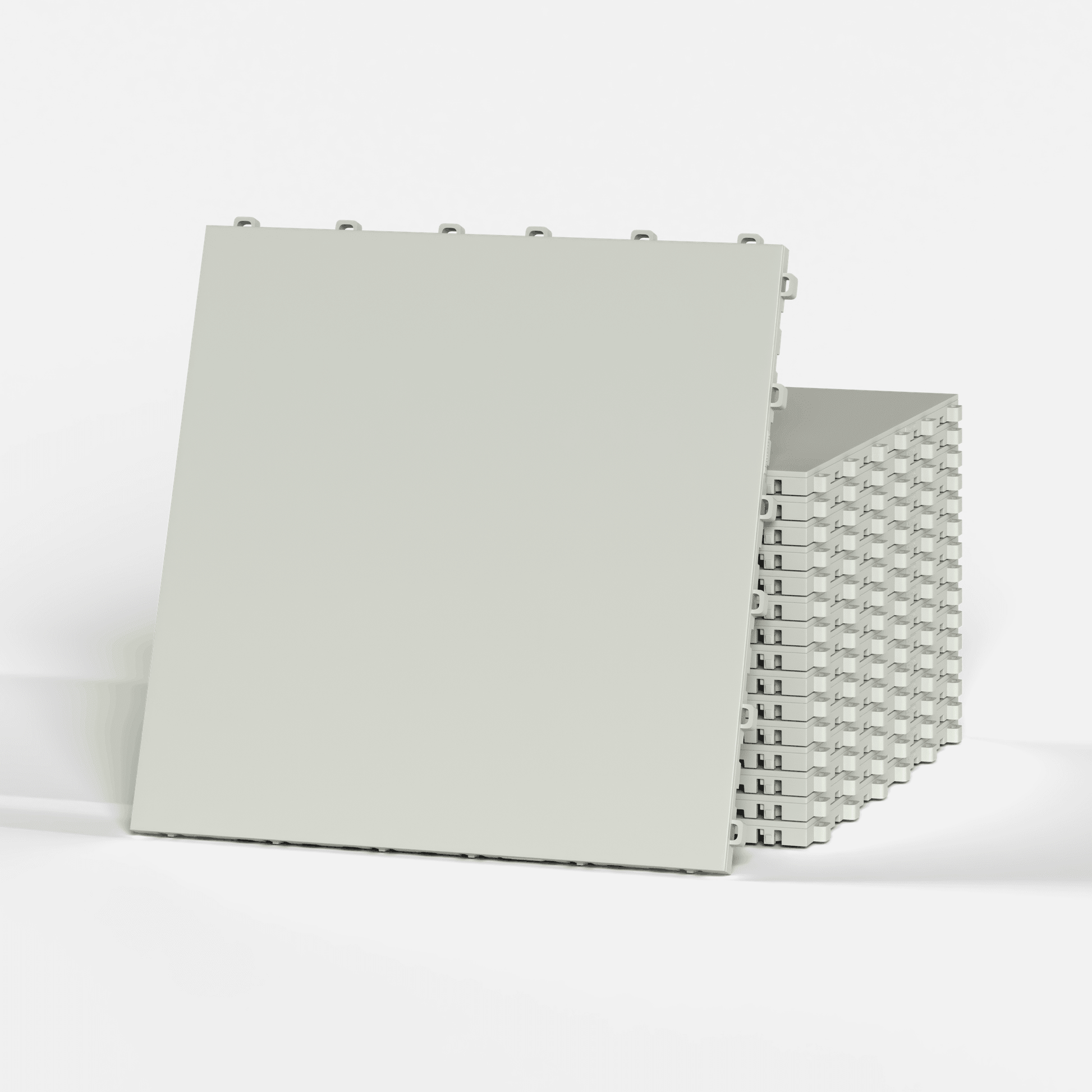 ULTRATONE modular floor tile in Coastal Grey, a stack of tiles