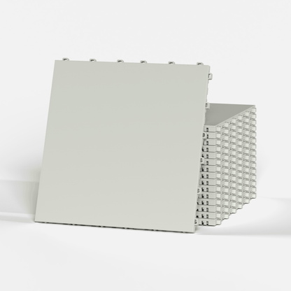 ULTRATONE modular floor tile in Coastal Grey, a stack of tiles