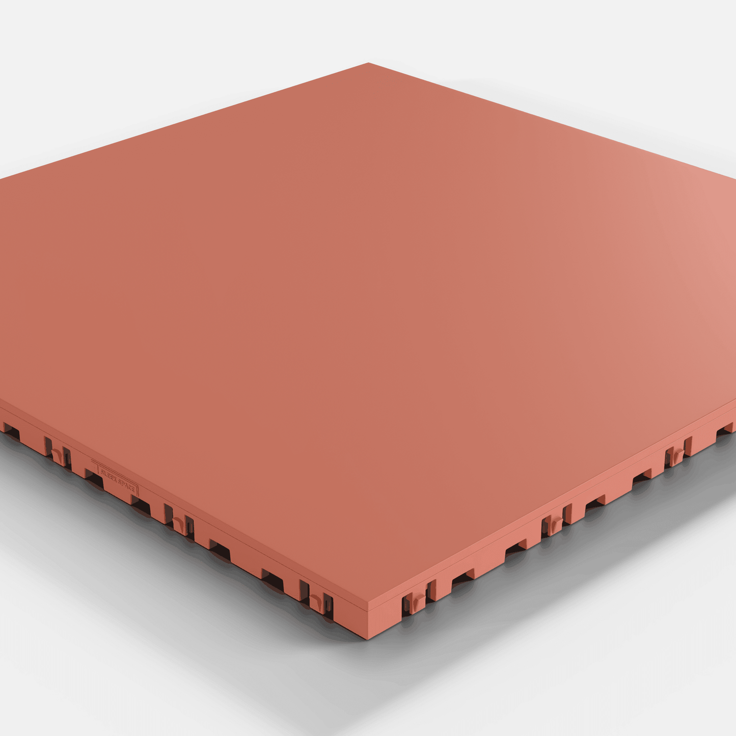 ULTRATONE modular floor tile in Outback Red, single tile seen from a low angle