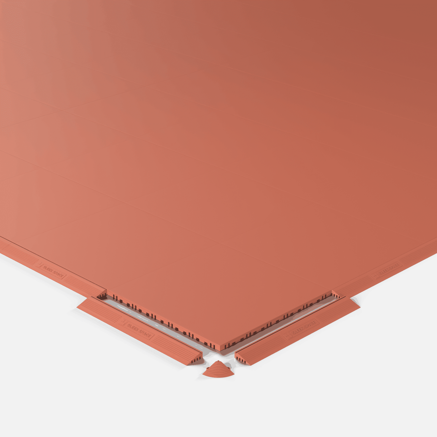 ULTRATONE modular floor tile in Outback Red, shown with an edge ramp