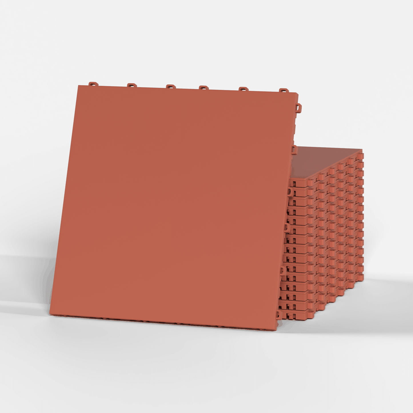 ULTRATONE modular floor tile in Outback Red, a stack of tiles