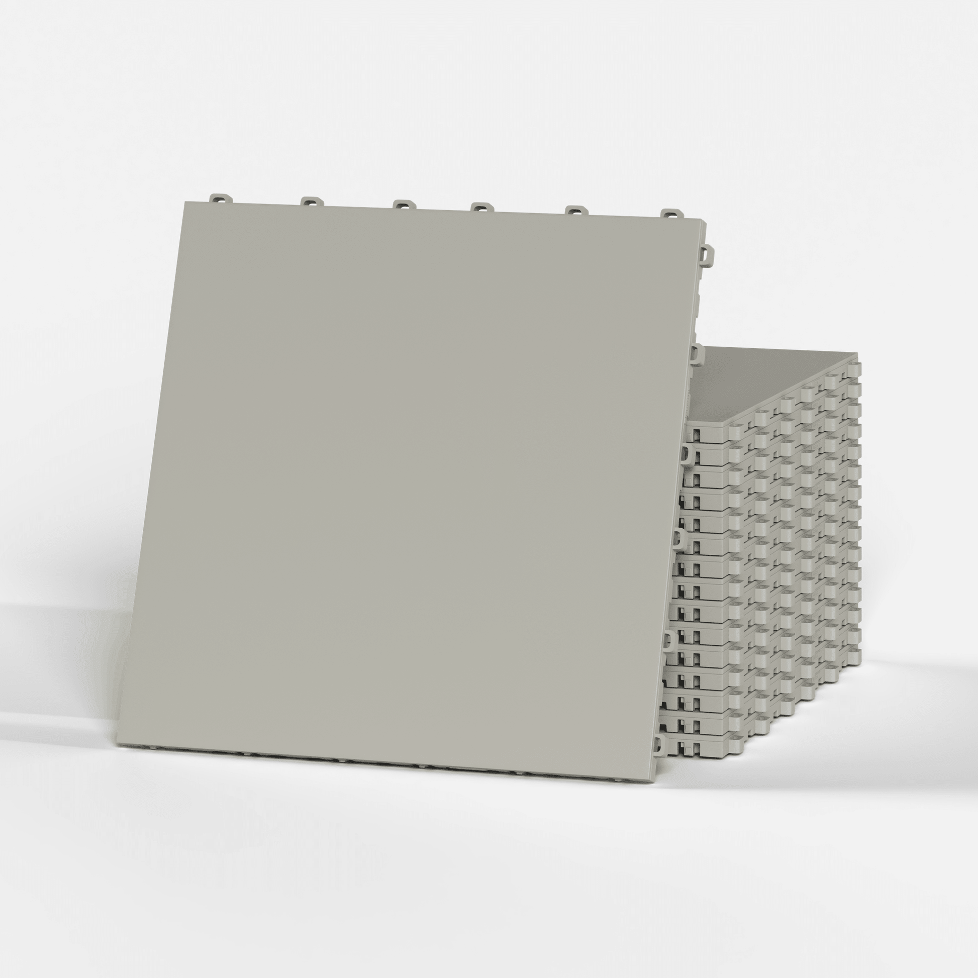 ULTRATONE modular floor tile in Pebble Beige, a stack of tiles