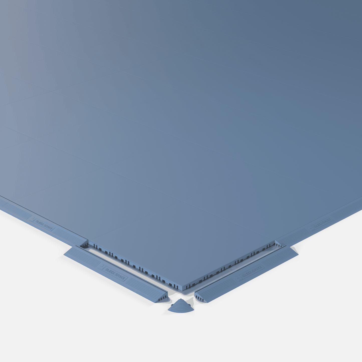 ULTRATONE modular floor tile in Steel Blue, shown with an edge ramp