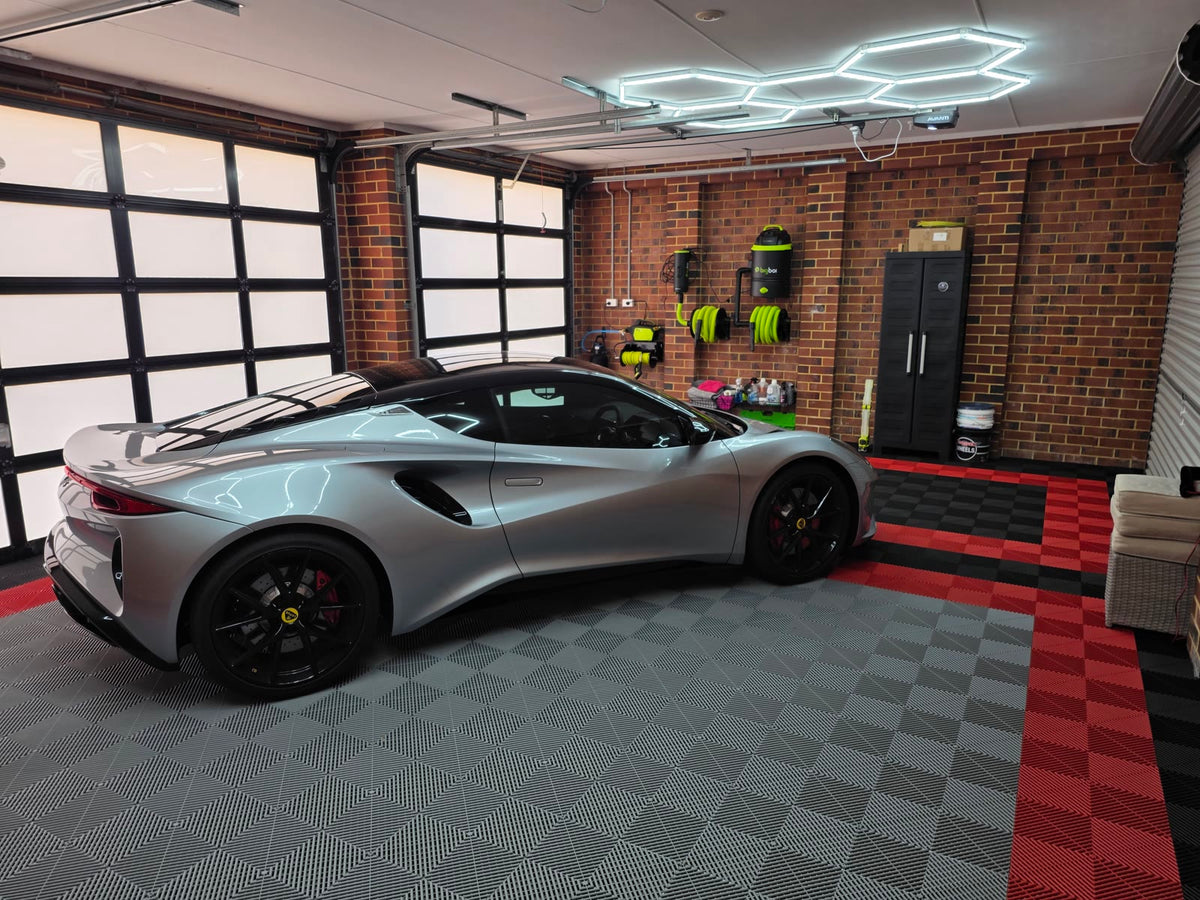 Jason's garage in WA: an ULTRAGRID floor in Silver Grey, Crimson Red and Jet Black under ULTRABEAM hexagon lights